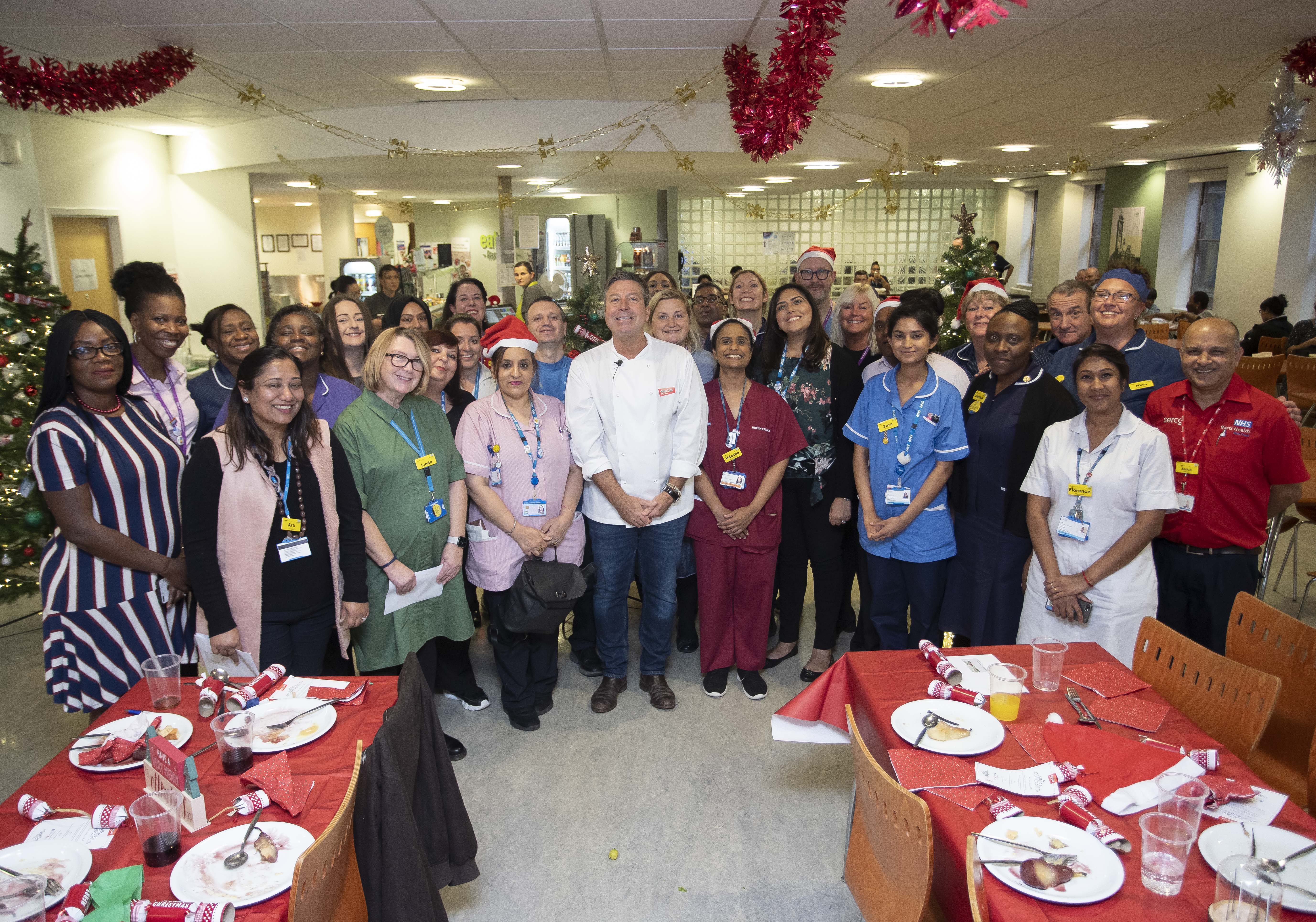 John Torode with staff at Newham Hospital